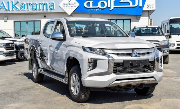 Buy Import Mitsubishi L200 White Car in Import - Dubai in Kailahun Buy Import Mitsubishi L200 White Car in Import - Dubai in Kailahun