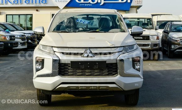 Buy Import Mitsubishi L200 White Car in Import - Dubai in Kailahun Buy Import Mitsubishi L200 White Car in Import - Dubai in Kailahun