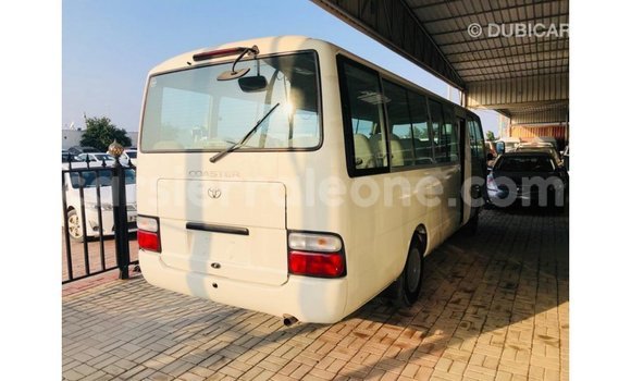 Acheter Import Voiture Toyota Coaster Blanc à Import - Dubai, Kailahun Acheter Import Voiture Toyota Coaster Blanc à Import - Dubai, Kailahun